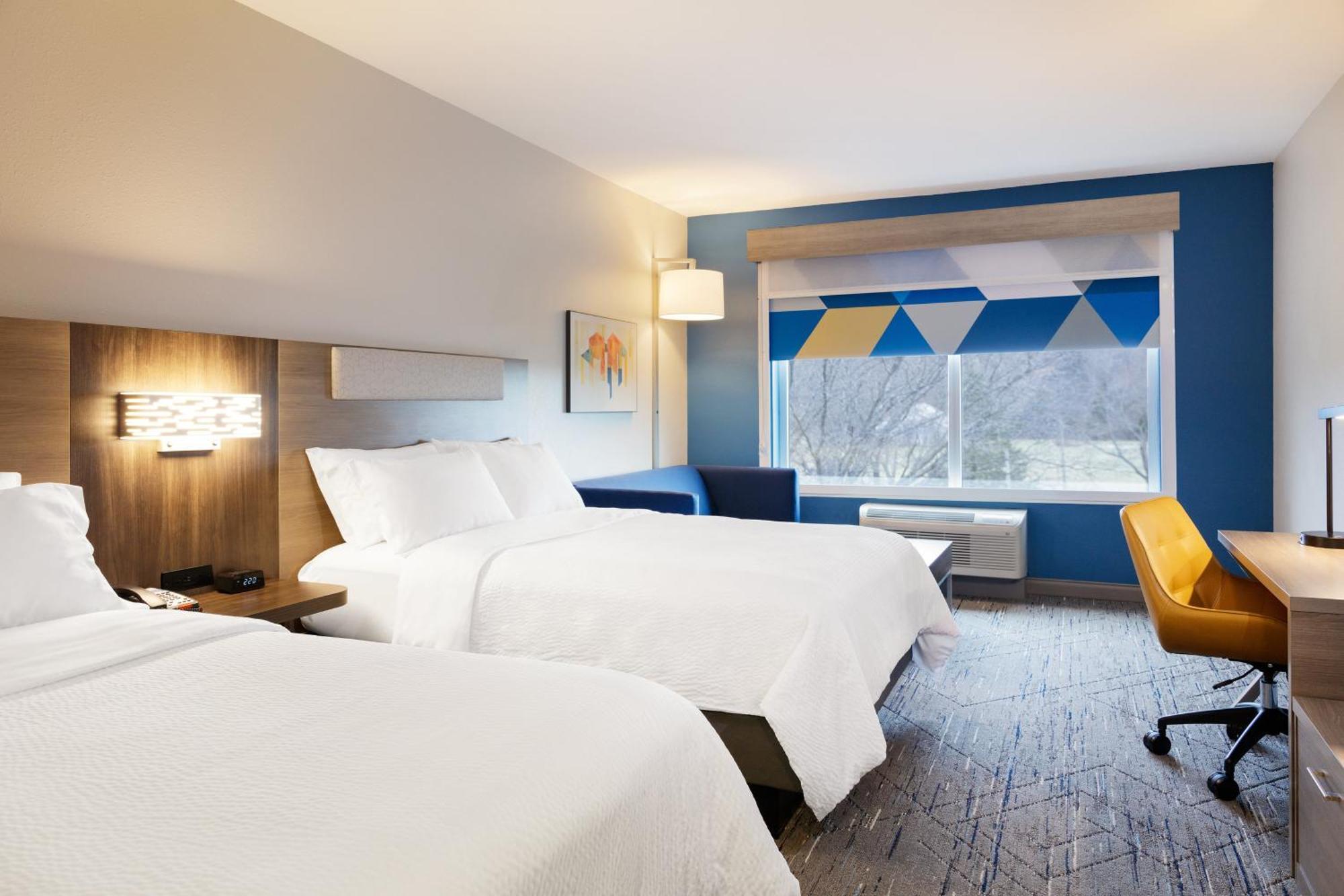 Queen Suite with Two Queen Beds and Sofa Bed